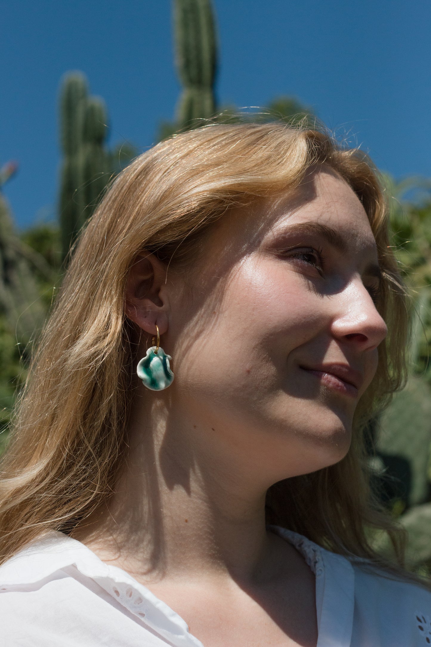 resilience hoop porcelain earrings