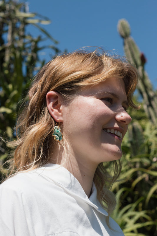 resilience hoop porcelain earrings