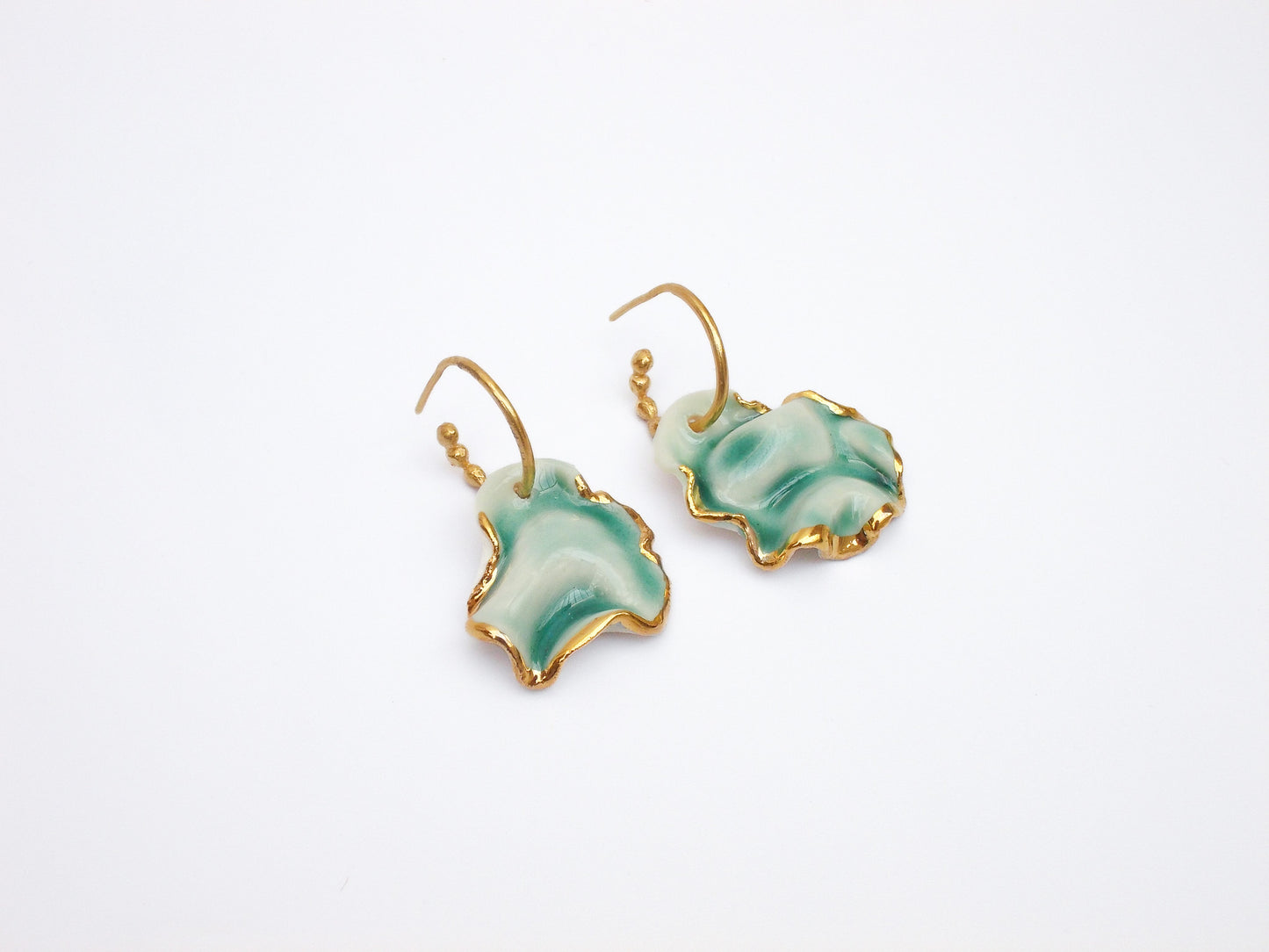 resilience hoop porcelain earrings