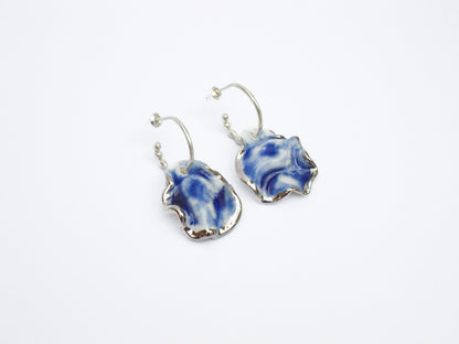 resilience hoop porcelain earrings