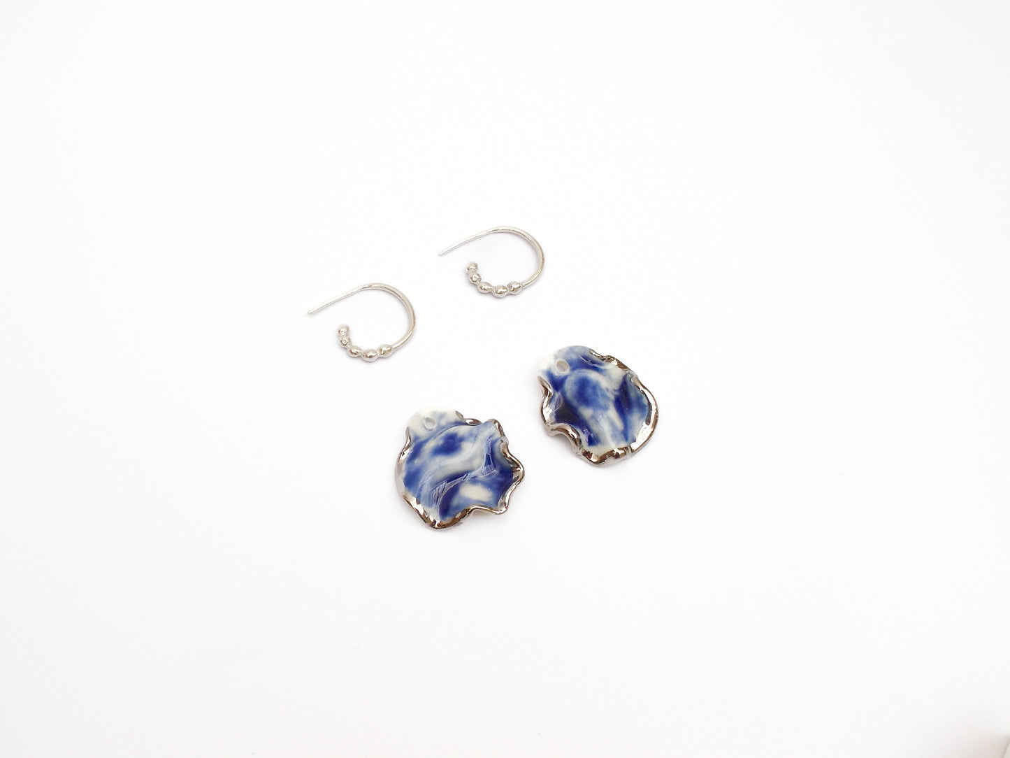 midnight calm hoop porcelain earrings